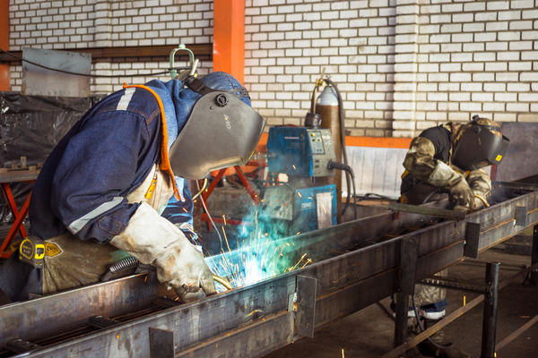 Two welders.