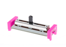 Pink littleBits i5 slide dimmer side view.