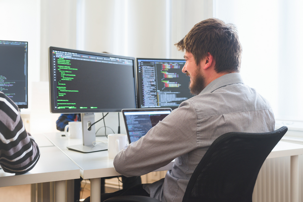 A software engineer working on code.